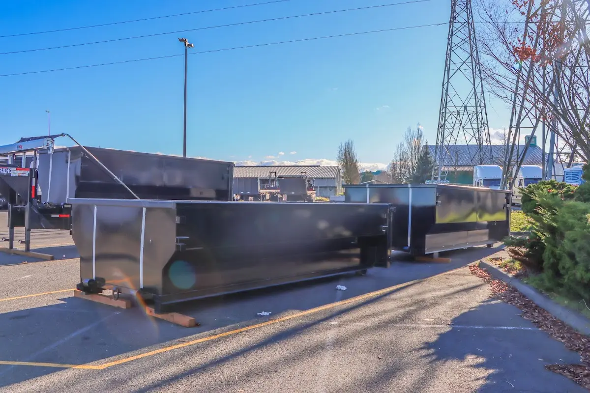 Roll-off dumpster ready for waste disposal at job site for 2 Yard Dumpster Rental in Sioux City